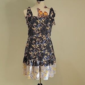JUN & IVY blue & yellow floral dress.  Ties at shoulder size is Large Juniors.